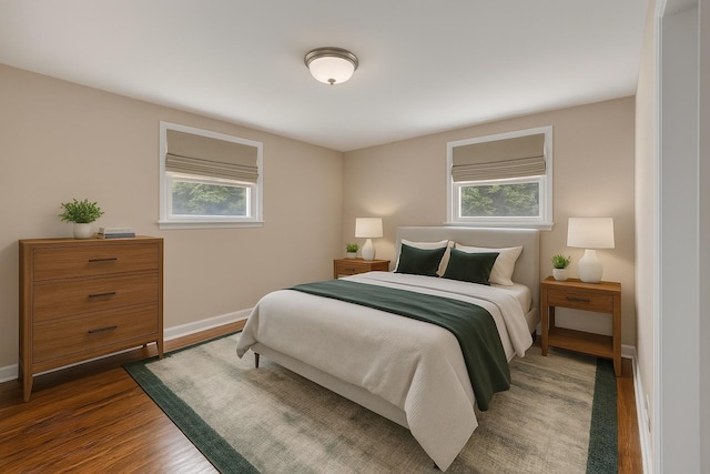 909 Woods Lake Dr, Madison, TN 37115 - bedroom featuring dark wood-style flooring and baseboards