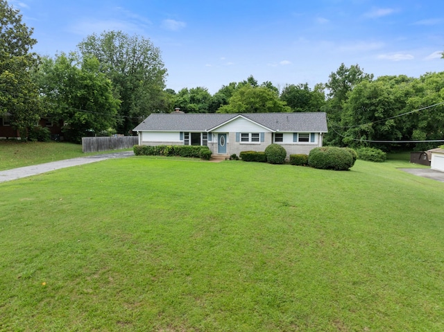 909 Woods Lake Dr, Madison, TN 37115 - ranch-style home featuring driveway and a chimney