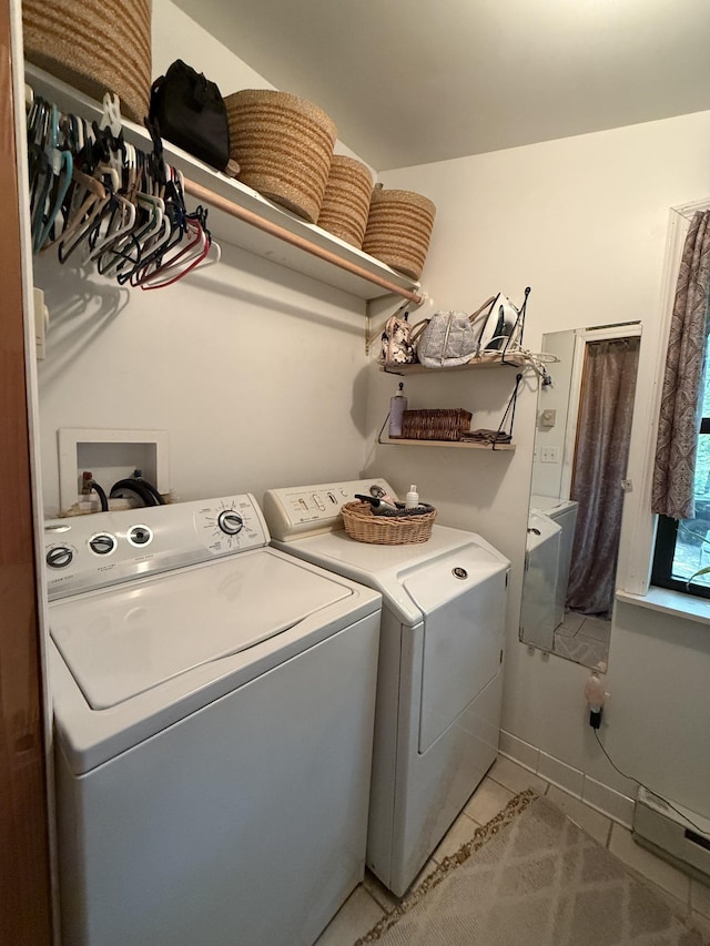 160 Webb Rd, Summertown, TN 38483 - washroom featuring washing machine and clothes dryer and light tile patterned floors