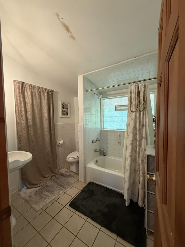 160 Webb Rd, Summertown, TN 38483 - full bath with tile walls, shower / tub combo, tile patterned floors, plenty of natural light, and a wainscoted wall