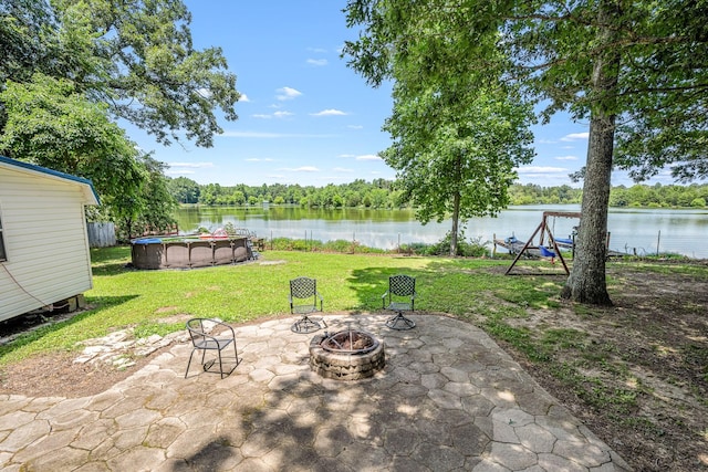55 Parker Pt, Beechgrove, TN 37018 - view of patio featuring a fire pit and a water view