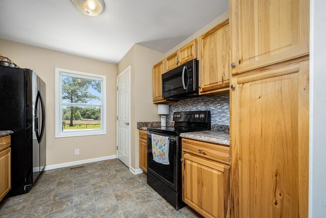 55 Parker Pt, Beechgrove, TN 37018 - kitchen with black appliances, decorative backsplash, and stone finish floors