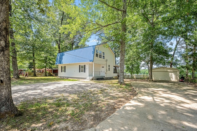55 Parker Pt, Beechgrove, TN 37018 - view of front of property featuring a metal roof, a shed, and a gambrel roof
