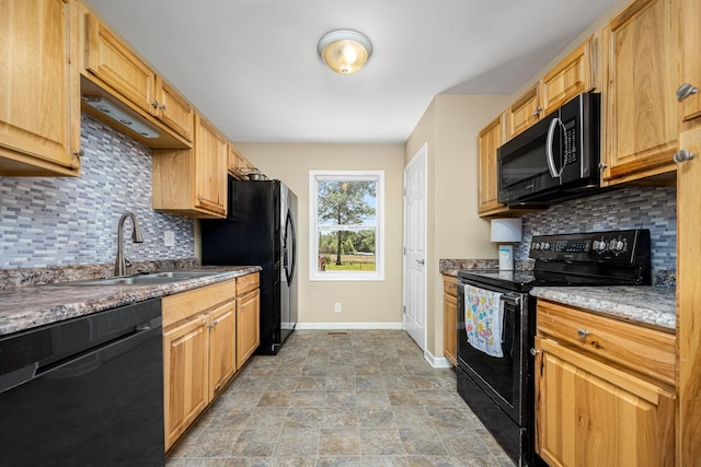 55 Parker Pt, Beechgrove, TN 37018 - kitchen featuring black appliances, backsplash, and stone finish flooring