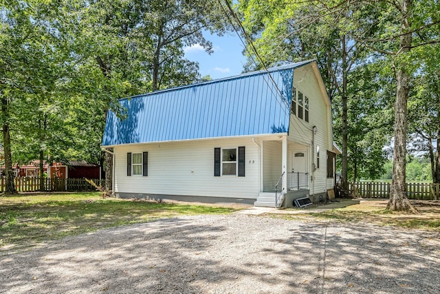 55 Parker Pt, Beechgrove, TN 37018 - view of front of house featuring a metal roof and a gambrel roof