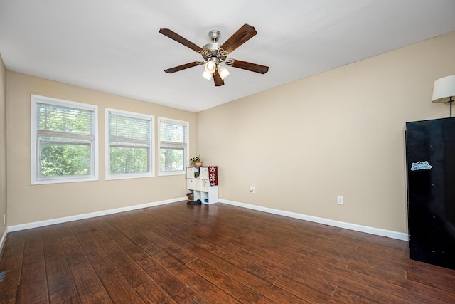55 Parker Pt, Beechgrove, TN 37018 - spare room featuring dark wood-type flooring, plenty of natural light, and ceiling fan