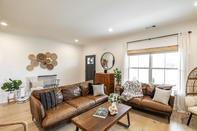 1446 Littleton Ranch Rd, Castalian Springs, TN 37031 - living area featuring light wood-style flooring, ornamental molding, and recessed lighting