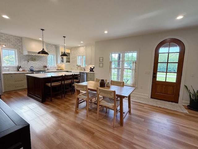 1782 Honey Ln, Estill Springs, TN 37330 - dining room featuring light wood finished floors, recessed lighting, and arched walkways