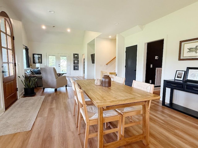 1782 Honey Ln, Estill Springs, TN 37330 - dining space with light wood finished floors, french doors, stairway, lofted ceiling, and recessed lighting