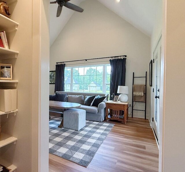 1782 Honey Ln, Estill Springs, TN 37330 - living room with high vaulted ceiling, a ceiling fan, and light wood-type flooring