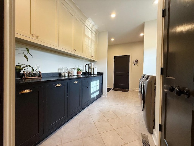 1782 Honey Ln, Estill Springs, TN 37330 - indoor wet bar featuring washing machine and clothes dryer, recessed lighting, and light tile patterned floors