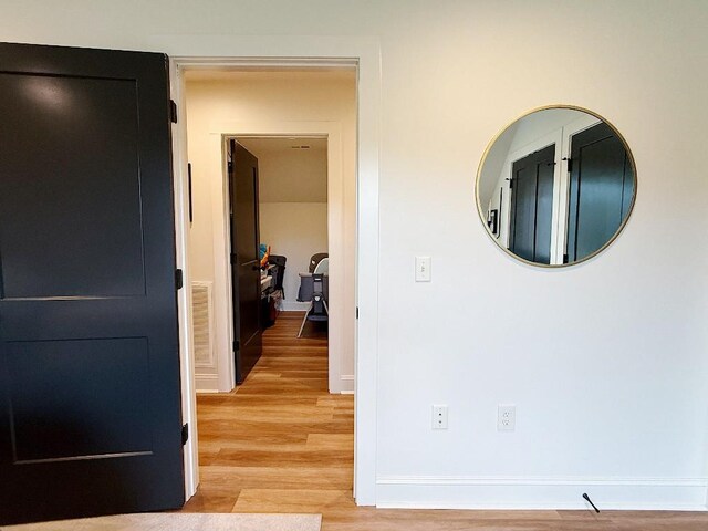 1782 Honey Ln, Estill Springs, TN 37330 - corridor with light wood finished floors and baseboards