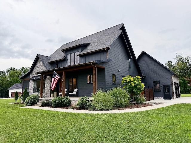 1782 Honey Ln, Estill Springs, TN 37330 - view of front of property featuring a porch, board and batten siding, and a front yard