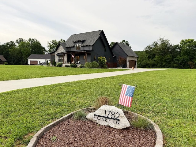 1782 Honey Ln, Estill Springs, TN 37330 - view of front of home with a front lawn and a garage