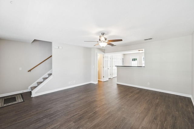 3138 Prater Ct, Murfreesboro, TN 37128 - unfurnished living room with a ceiling fan, dark wood finished floors, and stairs
