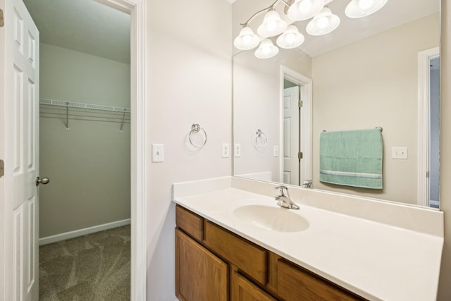 3138 Prater Ct, Murfreesboro, TN 37128 - bathroom with vanity and a walk in closet