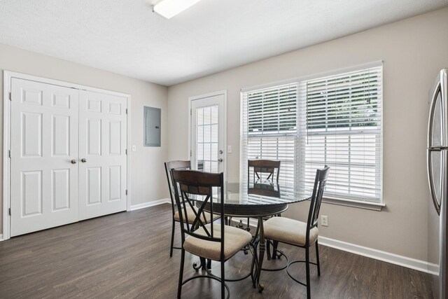 3138 Prater Ct, Murfreesboro, TN 37128 - dining room featuring dark wood-style floors, healthy amount of natural light, and electric panel