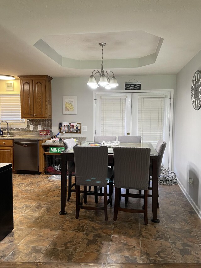 125 Monument Cir, Summertown, TN 38483 - dining area with a raised ceiling and a chandelier