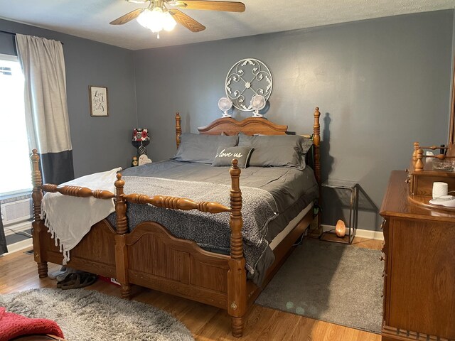 125 Monument Cir, Summertown, TN 38483 - bedroom featuring wood finished floors and a ceiling fan