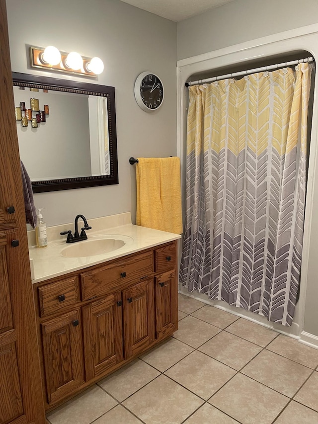 125 Monument Cir, Summertown, TN 38483 - full bath featuring vanity, tile patterned flooring, and a shower with shower curtain