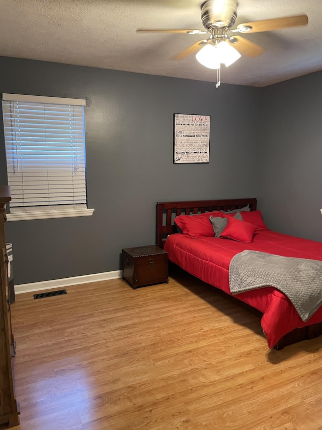 125 Monument Cir, Summertown, TN 38483 - bedroom with wood finished floors and ceiling fan