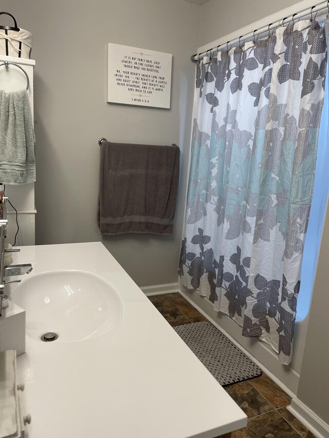 125 Monument Cir, Summertown, TN 38483 - bathroom featuring shower / bath combination with curtain, vanity, and stone finish flooring