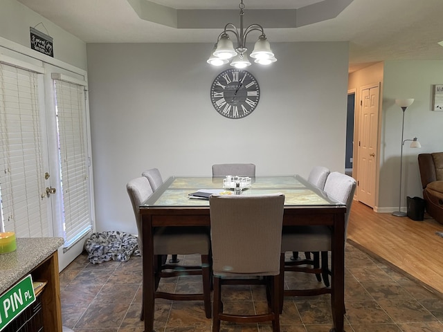 125 Monument Cir, Summertown, TN 38483 - dining space with stone finish floors and a chandelier