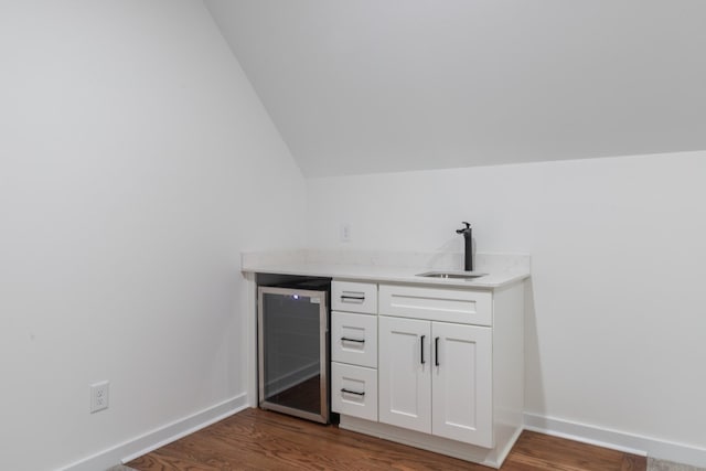2210 Garners Creek Rd, Dickson, TN 37055 - bar with beverage cooler, vaulted ceiling, and dark wood-style flooring