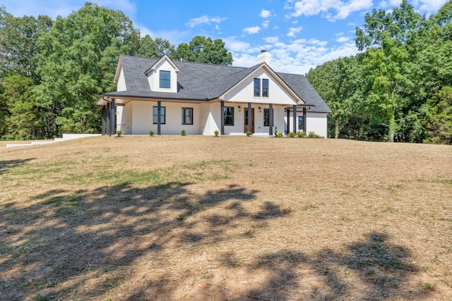 2210 Garners Creek Rd, Dickson, TN 37055 - modern farmhouse style home featuring a porch and a chimney