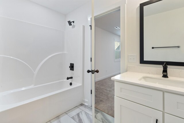 2210 Garners Creek Rd, Dickson, TN 37055 - bathroom with vanity, tub / shower combination, and marble look tile flooring
