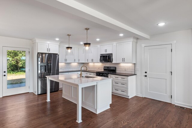 2210 Garners Creek Rd, Dickson, TN 37055 - kitchen featuring fridge with ice dispenser, black range with gas stovetop, dark wood-type flooring, backsplash, and white cabinets
