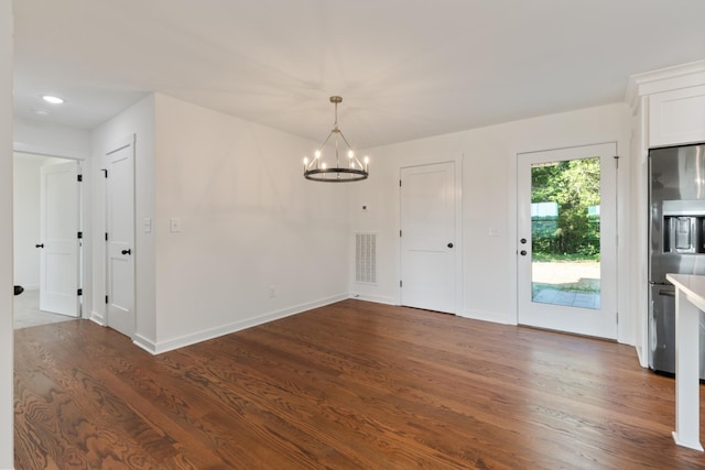 2210 Garners Creek Rd, Dickson, TN 37055 - unfurnished dining area with a chandelier and dark wood-style floors