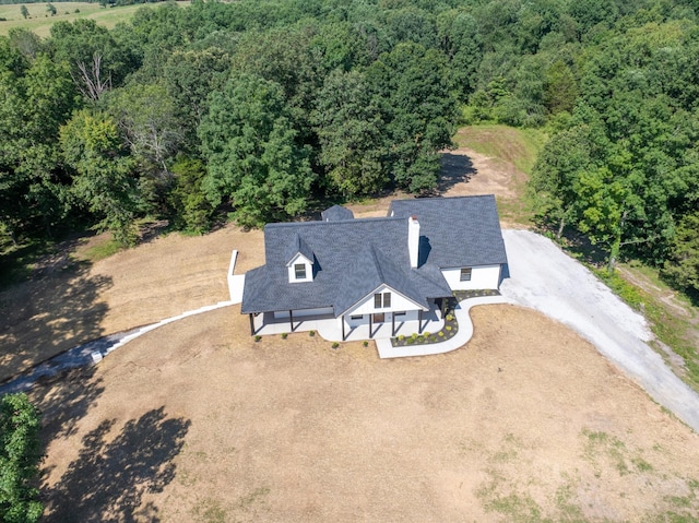 2210 Garners Creek Rd, Dickson, TN 37055 - aerial view of property and surrounding area featuring a heavily wooded area