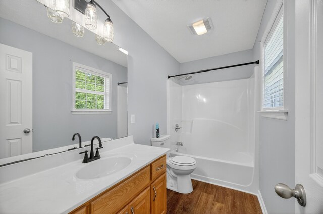 7 Summerfield Dr, Fayetteville, TN 37334 - bathroom with vanity, wood finished floors, and shower / washtub combination