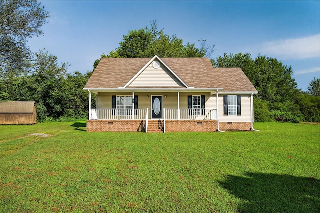 7 Summerfield Dr, Fayetteville, TN 37334 - view of front of property featuring covered porch, a front yard, crawl space, a storage shed, and a shingled roof