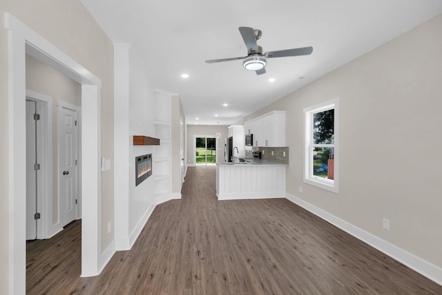 1104 Bridge St, Columbia, TN 38401 - unfurnished living room with a fireplace, dark wood finished floors, a ceiling fan, and recessed lighting