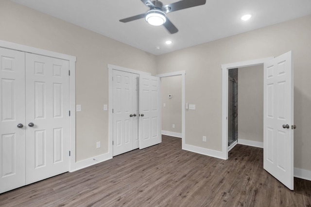 1104 Bridge St, Columbia, TN 38401 - unfurnished bedroom with two closets, wood finished floors, ceiling fan, and recessed lighting