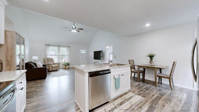 341 Holly Grove Rd, Lewisburg, TN 37091 - kitchen with appliances with stainless steel finishes, a ceiling fan, light wood-style floors, white cabinets, and high vaulted ceiling