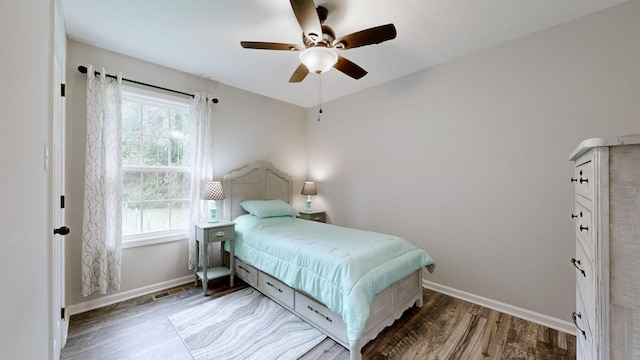 341 Holly Grove Rd, Lewisburg, TN 37091 - bedroom with wood finished floors and ceiling fan