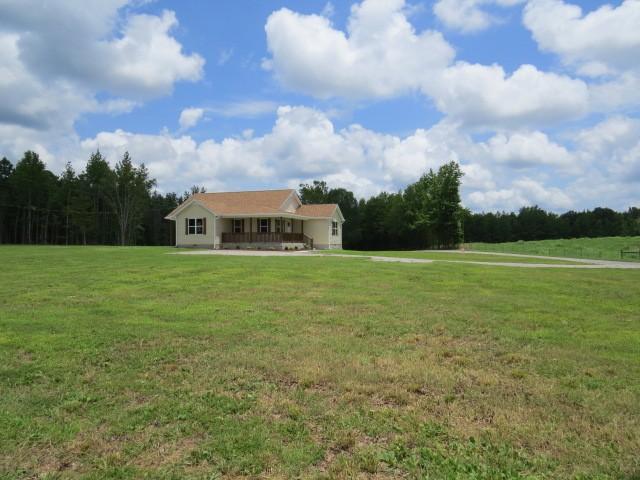 2300 Charlie Davis Rd, Goodspring, TN 38460 - view of green lawn with a view of trees