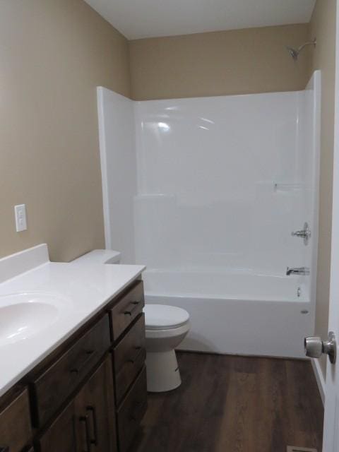 2300 Charlie Davis Rd, Goodspring, TN 38460 - bathroom featuring vanity, wood finished floors, and shower / washtub combination