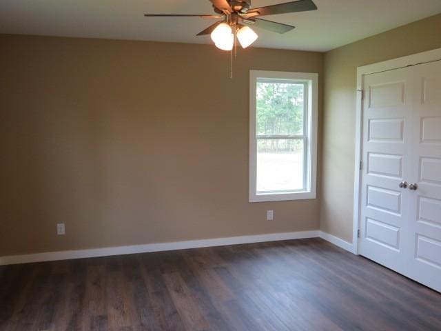 2300 Charlie Davis Rd, Goodspring, TN 38460 - empty room featuring ceiling fan and dark wood-style flooring