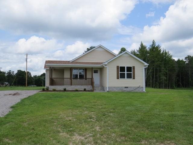 2300 Charlie Davis Rd, Goodspring, TN 38460 - view of front facade featuring crawl space, a porch, and a front lawn