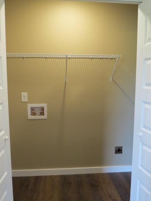 2300 Charlie Davis Rd, Goodspring, TN 38460 - laundry room featuring electric dryer hookup, dark wood-style flooring, and washer hookup