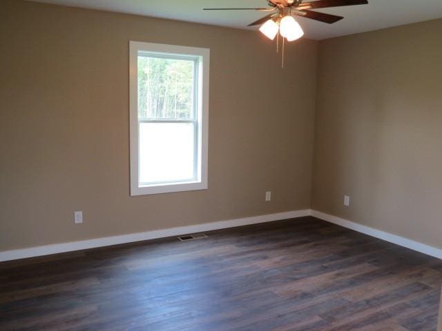 2300 Charlie Davis Rd, Goodspring, TN 38460 - unfurnished room with a ceiling fan and dark wood finished floors