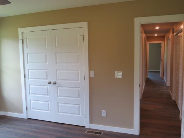 2300 Charlie Davis Rd, Goodspring, TN 38460 - unfurnished bedroom with a closet, wood finished floors, and recessed lighting