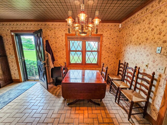 4623 Lebanon Rd, Murfreesboro, TN 37129 - dining space with a chandelier, ornamental molding, wallpapered walls, and brick patterned floors