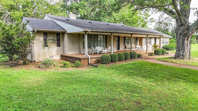 4623 Lebanon Rd, Murfreesboro, TN 37129 - ranch-style house with a front lawn, a chimney, covered porch, brick siding, and a shingled roof