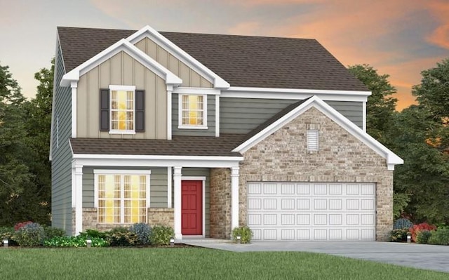 3397 Tucker Trce, Columbia, TN 38401 - view of front facade with stone siding, board and batten siding, concrete driveway, and a shingled roof