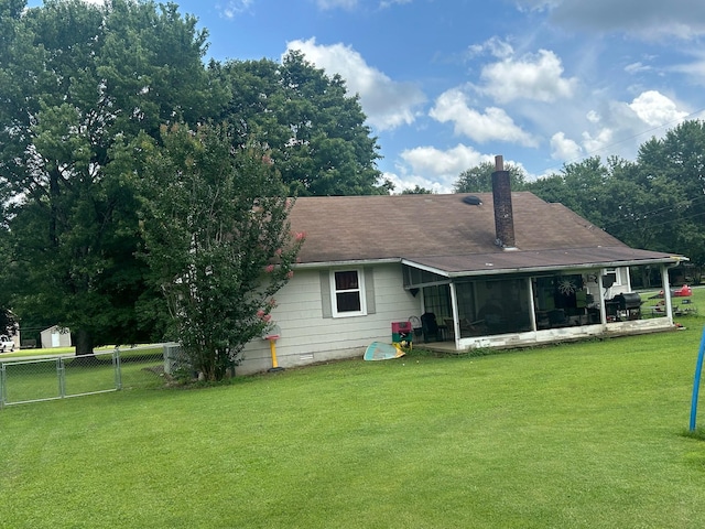 217 Millcreek Dr, Loretto, TN 38469 - rear view of property with a chimney, crawl space, a patio area, a sunroom, and roof with shingles